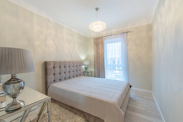 Luxury And Modern Bedroom Interior. King Size Bed and Furniture. Home
