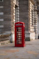 Closeup of Traditional red british telephone box in London, UK. Travelling concept. London landmarks. copy space banner