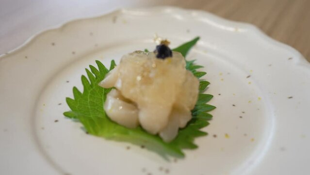 Zoom Out View of Hotate Sushi Served in Restaurant. concept of Japanese Food