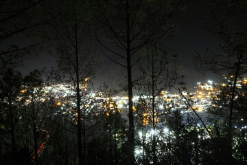 Gateway to the Himalayas: Capturing the Night Glow of Spiritual Uttarkashi, Uttarakhand © Naitik