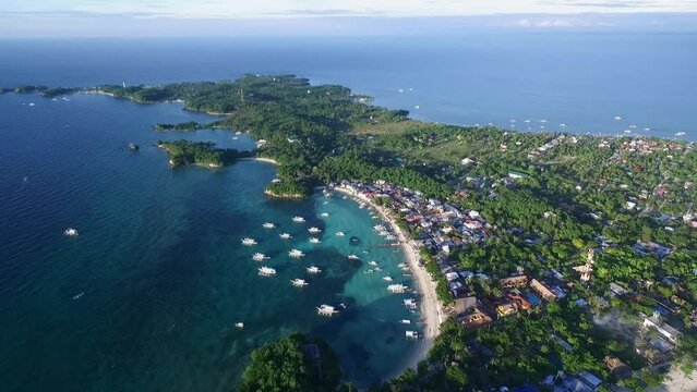 Malapascua Island Seashore in Cebu, Philippines. Sulu Sea, Boats and Beautiful Seascape in Background. Drone