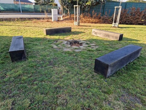 rustic bench made of halved debarked logs with legs made of logs. serves most often in parks in the countryside and by the fireplace. the undemanding shape and strength of wood will withstand decades