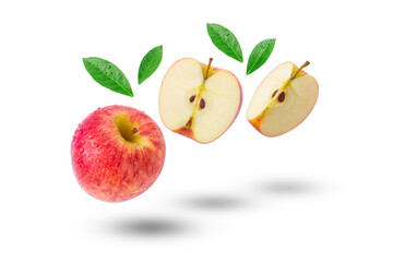 Flying red apple with slices and green leaf isolated on white background.