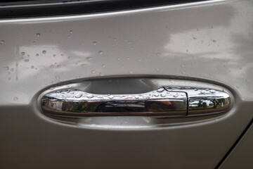 close up of a car door handle