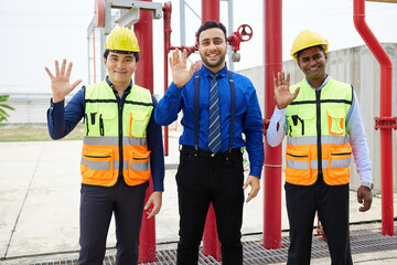 worker with businessman smiling and greeting pose in the factory