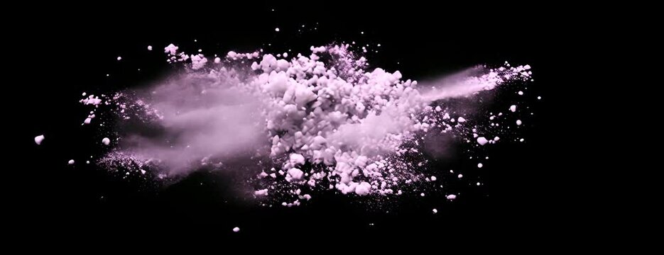 colorful powder dust explosion background. pink and purple powder explosion. loose powder, blush and eye shadow. colorful dust and splash on black background. 4K Video