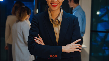 Portrait of successful executive businesswoman smart casual wear looking at camera and smiling,...