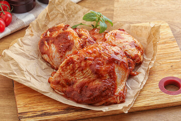 Marinated chicken leg in tomato sauce