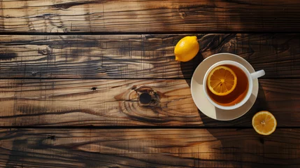 Foto op Canvas Hot Earl Grey tea with lemon slice on top. © Ghazanfar