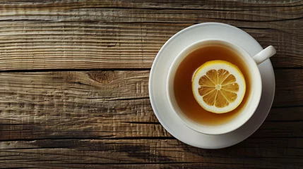 Fototapeten Hot Earl Grey tea with lemon slice on top. © Ghazanfar