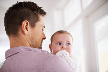 Father, baby and home with love, parent and bonding together with newborn and kid. Caring, family...