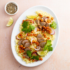 Couscous salad with lamb and chickpeas