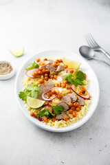 Couscous salad with lamb and chickpeas