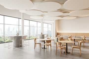 Stylish restaurant interior with chairs and tables, eating space and window