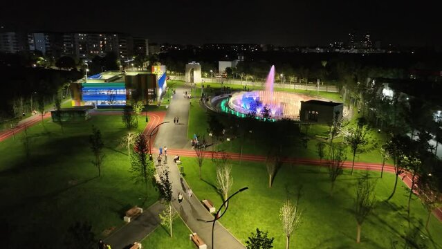 drone video with park and artesian fountain