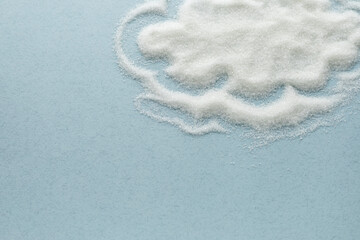 cloud of sugar on a light blue background, sugar free concept