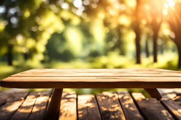 Empty wooden deck table over green meadow bokeh background for product montage display. Spring or summer season concept