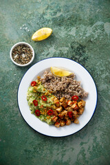 Green buckwheat with chicken and avocado mash