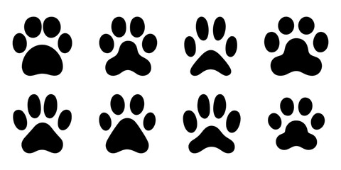 Vector image of flat silhouettes of dog paws, prints, on a white background