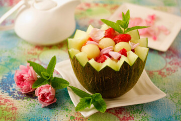 Stuffed melon with rose flavor.
