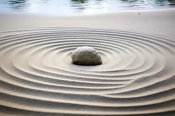Aluminium Prints Stones in the sand Centered Zen rock causing ripples in the surrounding sand