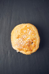 A beautiful gourmet scone served with tea and coffee, strawberry jam and clotted cream. traditional...