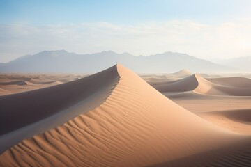 Fototapeta na wymiar Sand dunes shaped by nature's breath