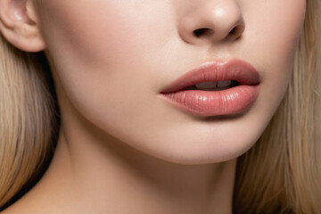 Fototapeta premium Close-up on girl beautiful lips and jaw line