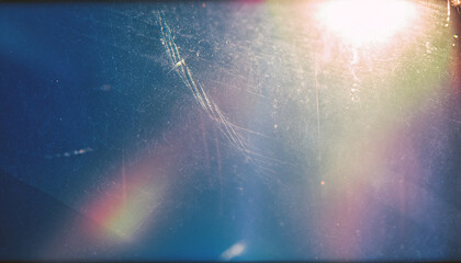 Dust scratches overlay. Old film effect. Blue distressed faded glass with smeared dirt stains colorful rainbow lens flare design. sun light abstract background texture - obrazy, fototapety, plakaty