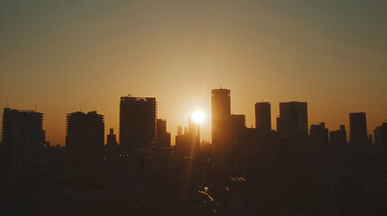 A city skyline silhouette during the golden hour.