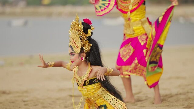 Bali dancers performing traditional balinese dance in indonesia, cultural identify