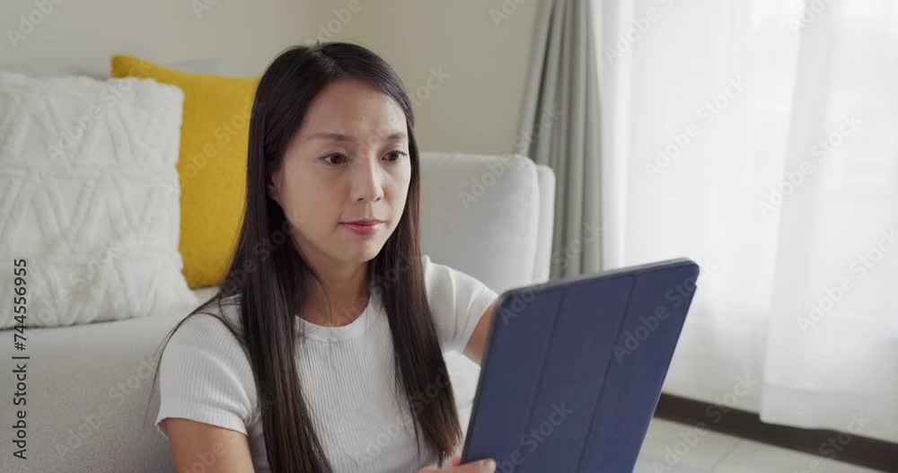 Poster Woman use tablet computer at home