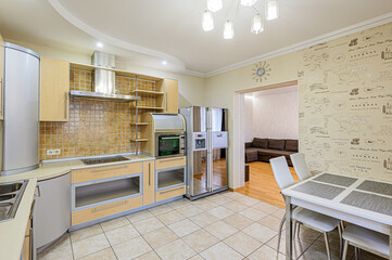 interior kitchen and dining room, refectory area, cooking equipment, table furniture, stove