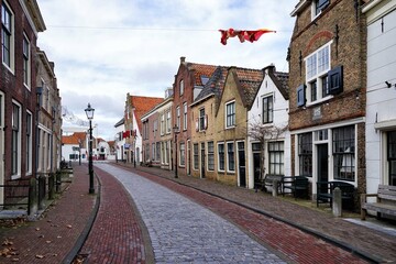 Lovely street in Brielle
Brielle, Den Briel, Voorne aan Zee, South Holland, Netherlands, Holland, Europe.
