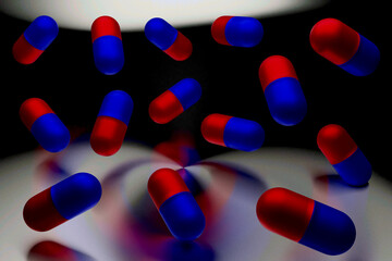 Red and blue tablet with dark Background