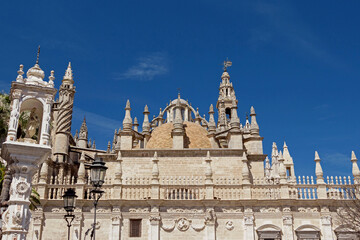 exterior architecture of Cathedral church in Seville, Spain - 744582969