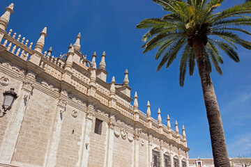 exterior architecture of Cathedral church in Seville, Spain - 744583183