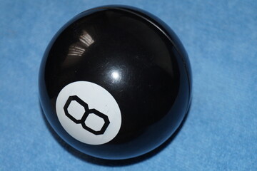 black ball with number 8 on a blue background