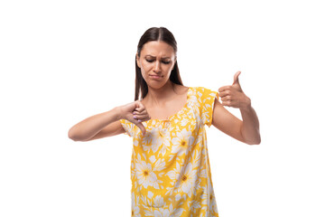 young attractive brunette woman showing like and dislike