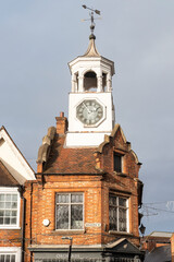 View of a historic clock tower found in the center of the small market town, its brickwork and design reflecting traditional English architecture styles, Ampthill, Bedfordshire, UK © Ana