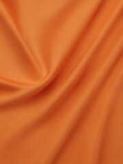 Fototapeta premium a orange close up fabric texture background