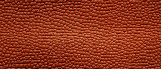 Textured Red Leather Close-Up Background. Close-up of red leather texture with a pattern of interwoven lines, suitable for backgrounds or detailing