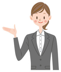 案内するスーツの女性　新入社員