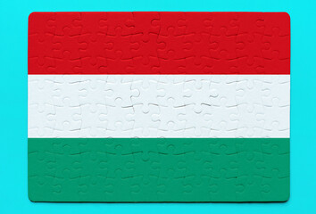 Hungarian Flag Jigsaw Puzzle on Blue Background