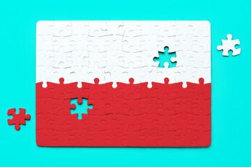 Polish Flag Puzzle with Final Pieces to Set in Place