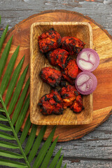 Famous Indian non veg appetizer , spicy dish called Achari chicken kebab also called Chicken kebab. Made with spices and herbs. Chicken tandoori kabab for lunch or dinner served hot and eat with rice