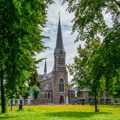 Foto auf Leinwand Street scene with church in Oosterhout, Netherlands  © Gert-Jan van Vliet