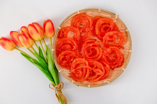 Jalebi or Jilebi Jangri - traditional Indian festival sweet isolated with white background. Popular Indian sweet Jalebi and Fafda served with Sambhara.Also called Jilapi,zulbia,mushabak and zalabia