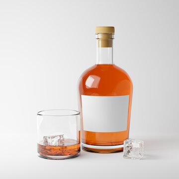 Bottle with blank label and glass of rum with ice isolated over white background. Mockup template. 3d rendering.