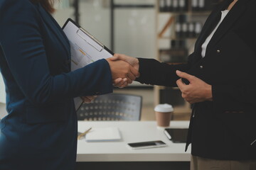 Business handshake for teamwork of business merger and acquisition,successful negotiate,hand...